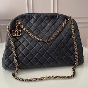 Authentic Chanel Mademoiselle bowling bag  in black quilted calfskin leather